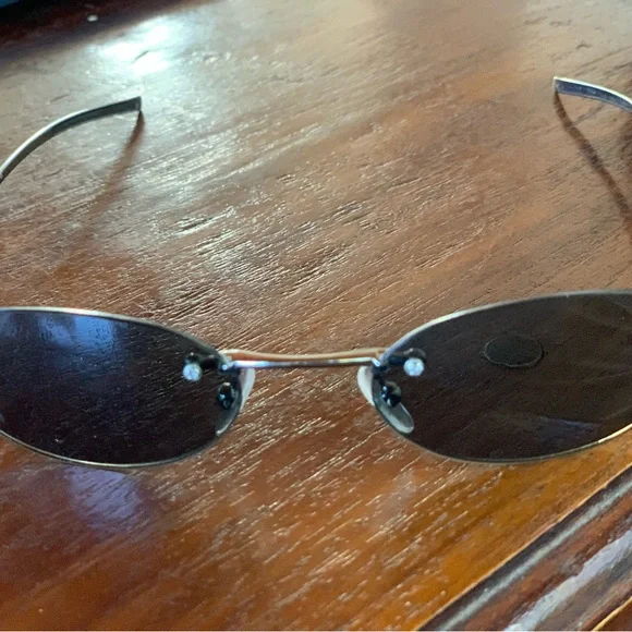 Gucci Silver Rimless Sunglasses - Picture 3 of 12